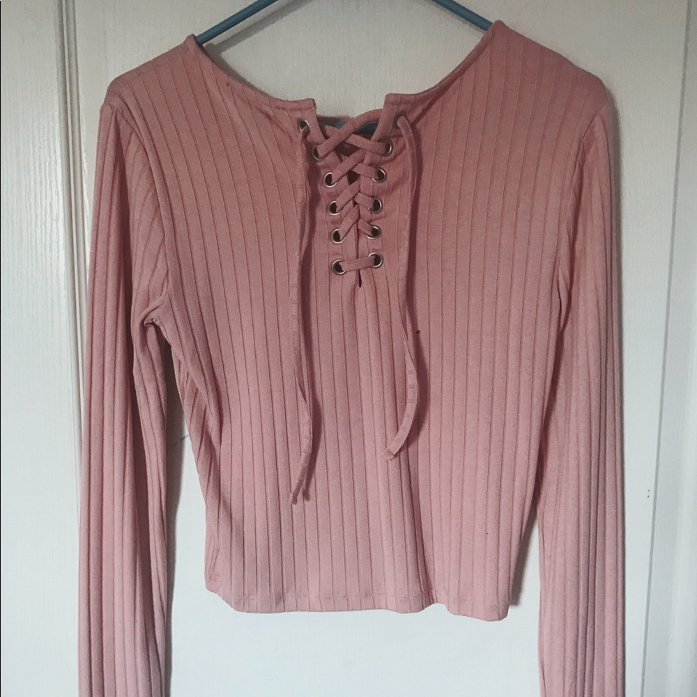 pink long sleeved lace-up top